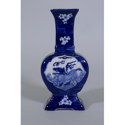 96 - A Chinese blue and white vase with kylin and prunus blossom decoration, 24cm high