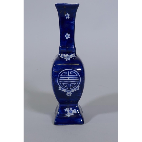 96 - A Chinese blue and white vase with kylin and prunus blossom decoration, 24cm high