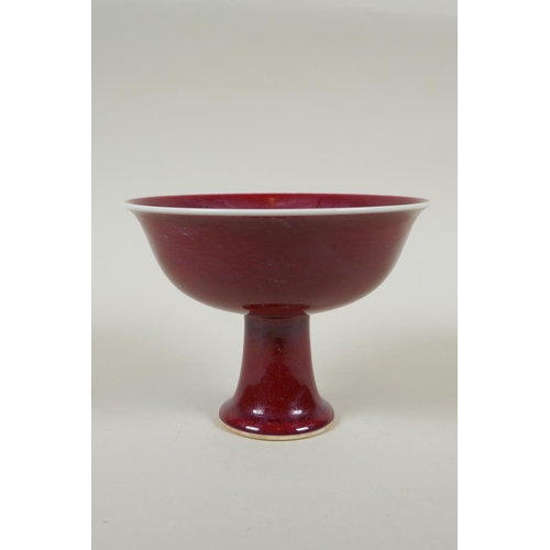 98 - A Chinese flambe glazed porcelain stem bowl, Xuande character mark to base, 12cm high, 16cm diameter