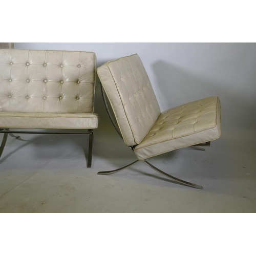 1070 - A pair of Barcelona style chairs, chromed steel frames and leather cushions, lack webbing