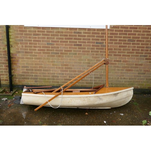 1089 - A vintage sailing dinghy, 233 x 107cm beam