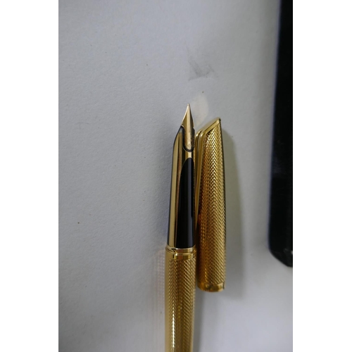 329 - A Watermans gold plated fountain pen with 18ct nib in box, appears unused, and a Parker Sonnet lacqu... 