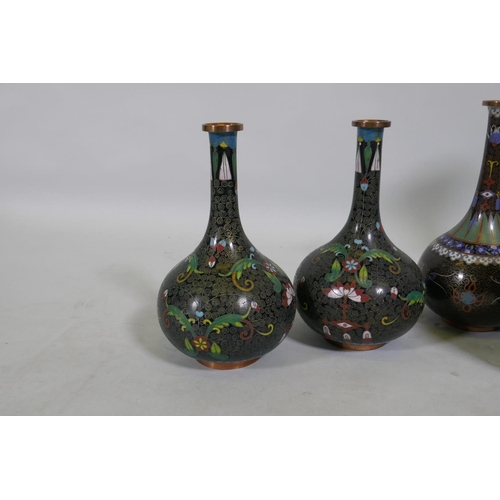 10 - A collection of Chinese cloisonne vases with dragon and floral decoration, largest 31cm high