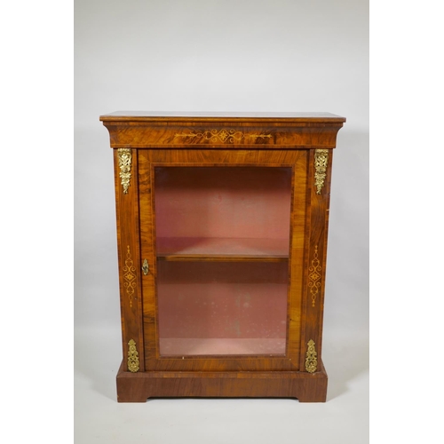 1011 - A Victorian inlaid figured walnut pier cabinet with ormolu mounts and single glazed door, 78 x 32 x ... 