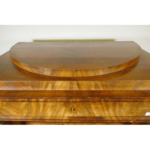 1013 - A C19th Danish figured mahogany secrétaire à abattant,  in two sections, the top ... 