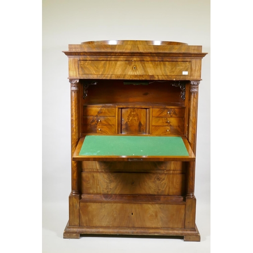 1013 - A C19th Danish figured mahogany secrétaire à abattant,  in two sections, the top ... 