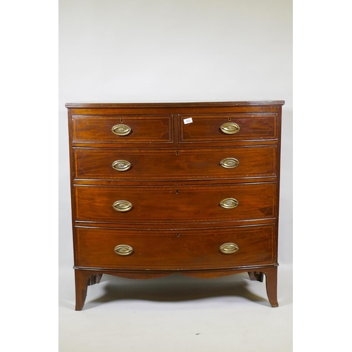 1023 - A George III inlaid mahogany bowfront chest of two plus three drawers, with brass plate handles, rai... 