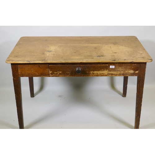 1024 - An early C19th pine sculley table with single drawer and scrubbed top, raised on tapering supports, ... 