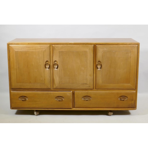 1025 - An Ercol blond elm Windsor sideboard, Model 468, 129 x 44cm, 76cm high