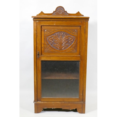 1026 - A Victorian walnut music cabinet with carved back and door, 50 x 34 x 99cm