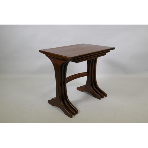 1040 - A mid century G-Plan teak nest of tables, largest 56 x 40cm, 52cm high