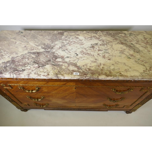 1042 - A French Louis XV  style three drawer commode with breccia marble top and brass mounts and handles, ... 