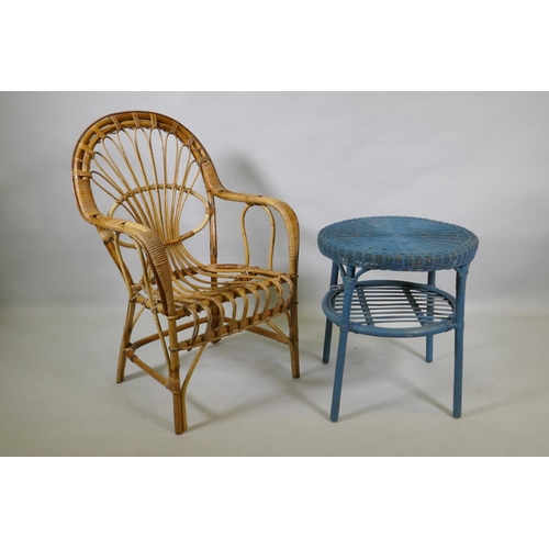 1048 - A vintage bamboo cane open armchair and a painted can and bamboo side table