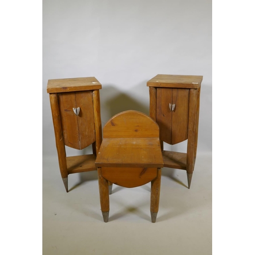 1052 - A pair of pine bedside cupboards and a pine stool, ensuite to the previous lot, with the same Paul R... 