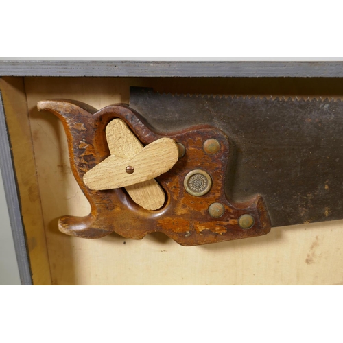 1055 - A vintage painted tool chest containing a collection of carpenter's tools, 78 x 43cm, 47cm high