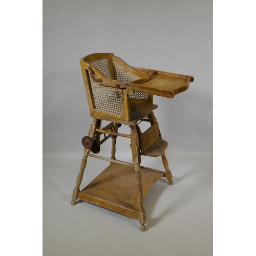 1061 - An antique oak cot, a child's metamorphic chair and a cane seated child's chair, cot 88cm long