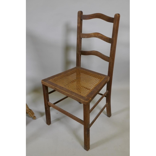 1061 - An antique oak cot, a child's metamorphic chair and a cane seated child's chair, cot 88cm long