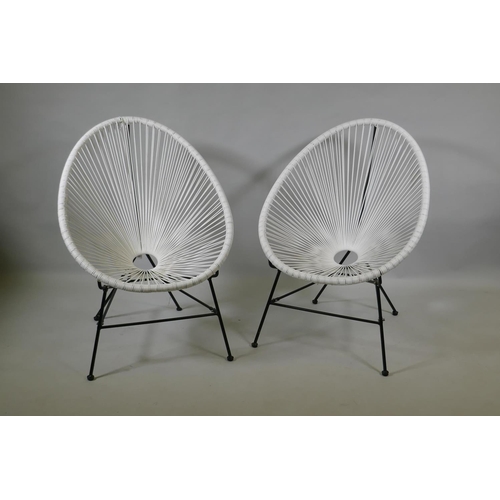 1063 - A pair of white rattan style Acapulco garden chairs