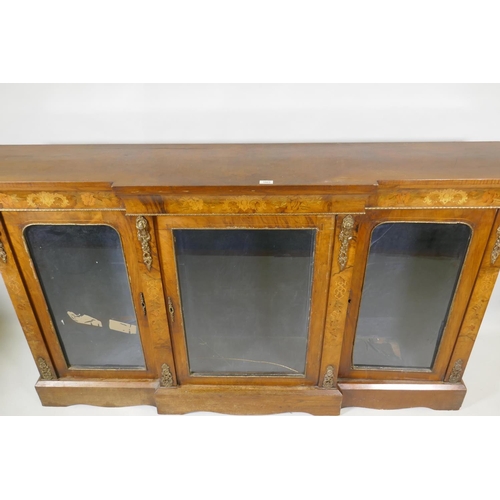 1065 - A Victorian marquetry inlaid breakfront walnut credenza with moulded frieze top over three arched gl... 