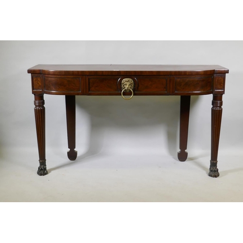 A Georgian mahogany breakfront serving table with panelled frieze and single drawer, raised on reeded  tapering supports with claw feet (adapted), 155 x 50 x 87cm