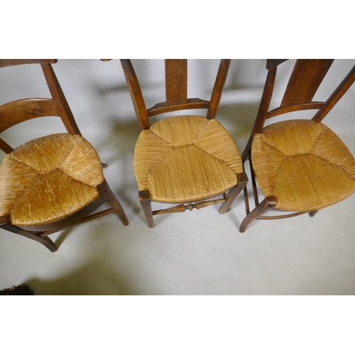 1078 - A harlequin set of three antique provincial rush seated dining chairs