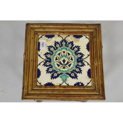 1081 - An antique Oriental bamboo occasional table inset with an Iznik tile top, 30 x 30cm, 47cm high