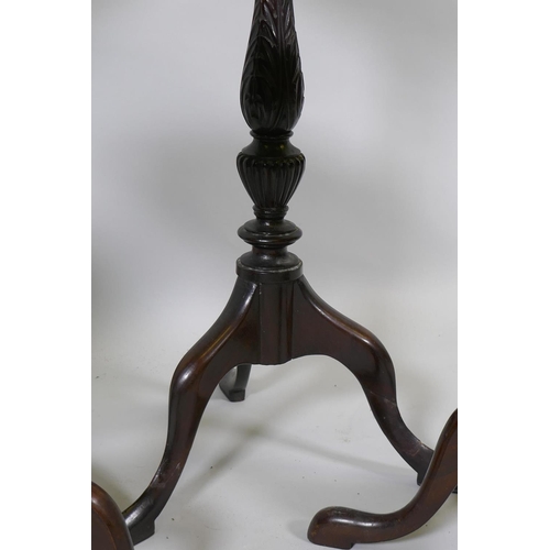 1083 - A pair of mahogany wine tables with dished tops, raised on turned columns with tripod supports, 27cm... 