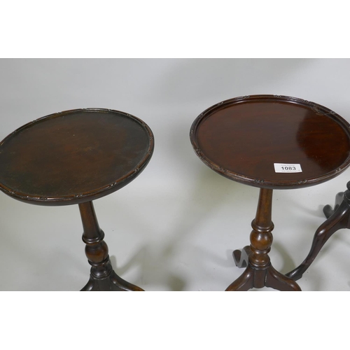 1083 - A pair of mahogany wine tables with dished tops, raised on turned columns with tripod supports, 27cm... 