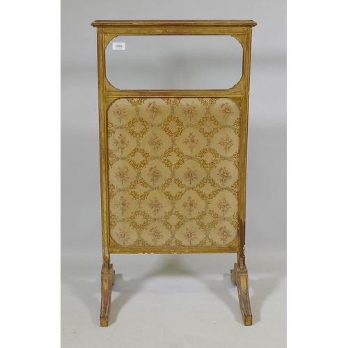 1086 - A C19th giltwood firescreen with glazed upper and inset textile panel, 50 x 94cm