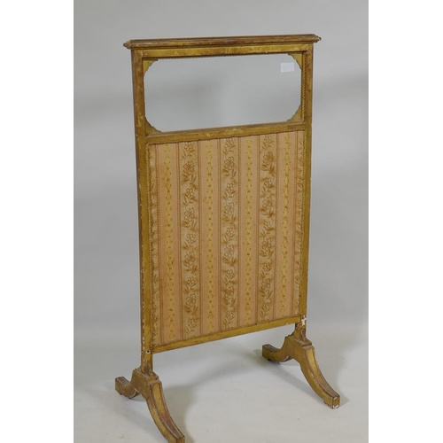 1086 - A C19th giltwood firescreen with glazed upper and inset textile panel, 50 x 94cm