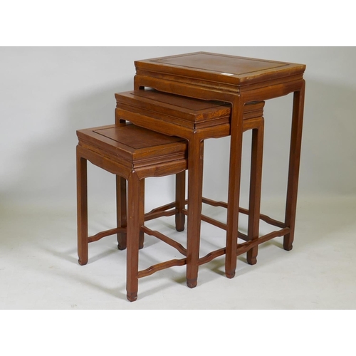 1092 - A nest of three Chinese hardwood occasional tables, 48 x 36 x 69cm