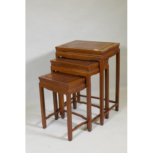 1092 - A nest of three Chinese hardwood occasional tables, 48 x 36 x 69cm