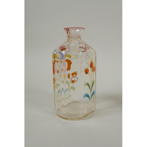 11 - Two C18th/C19th enamelled Stiegel type glass bottles and a similar type perfume bottle, largest 18cm... 