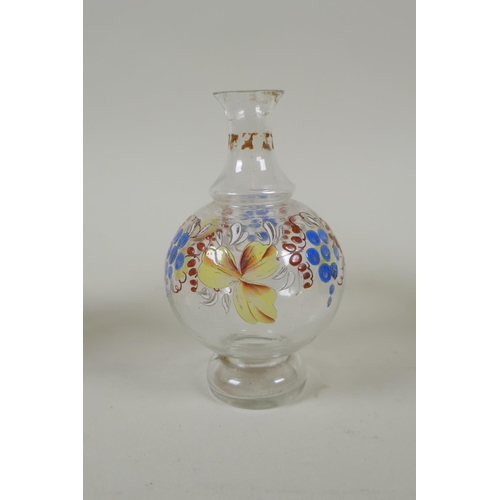 11 - Two C18th/C19th enamelled Stiegel type glass bottles and a similar type perfume bottle, largest 18cm... 