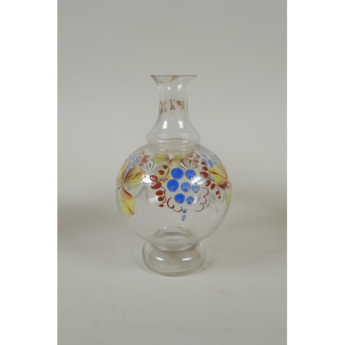 11 - Two C18th/C19th enamelled Stiegel type glass bottles and a similar type perfume bottle, largest 18cm... 