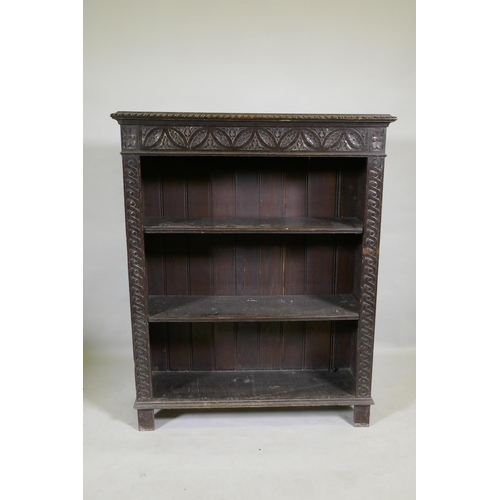 1101 - A C19th carved oak open bookcase, 91 x 30cm, 114cm high