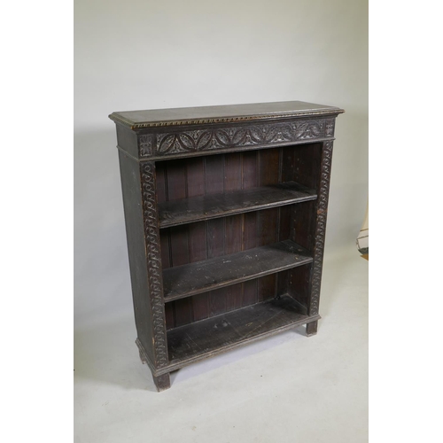 1101 - A C19th carved oak open bookcase, 91 x 30cm, 114cm high