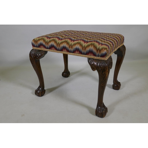 1102 - A Georgian style mahogany stool raised on carved cabriole legs with claw and ball feet, 57 x 46 x 47... 