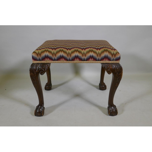 1102 - A Georgian style mahogany stool raised on carved cabriole legs with claw and ball feet, 57 x 46 x 47... 