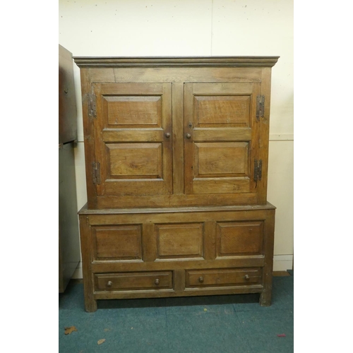 1104 - An C18th oak livery cupboard, 140 x 54cm, 177cm high