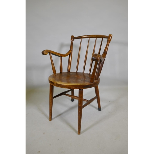 1108 - An antique bentwood elbow chair, back legs reduced