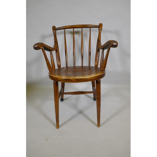 1108 - An antique bentwood elbow chair, back legs reduced