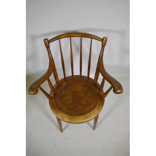 1108 - An antique bentwood elbow chair, back legs reduced