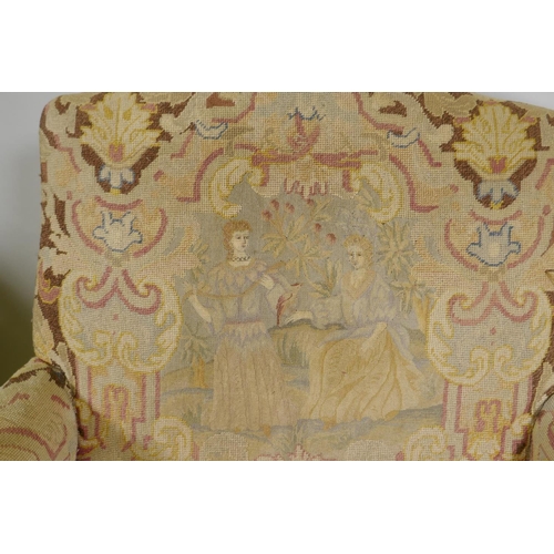 1117 - An C18th style French carved and painted beechwood framed arm chair with tapestry covers