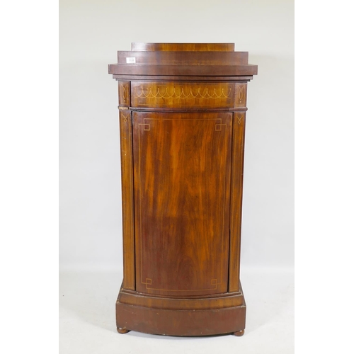 1130 - A C19th Danish inlaid mahogany bow fronted cupboard, with single frieze drawer, bears signature of m... 