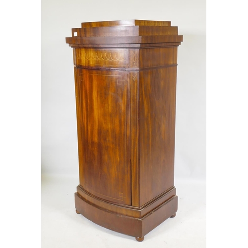 1130 - A C19th Danish inlaid mahogany bow fronted cupboard, with single frieze drawer, bears signature of m... 