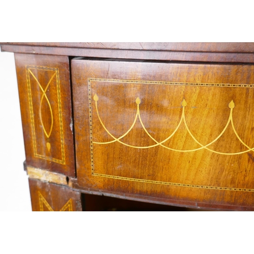 1130 - A C19th Danish inlaid mahogany bow fronted cupboard, with single frieze drawer, bears signature of m... 