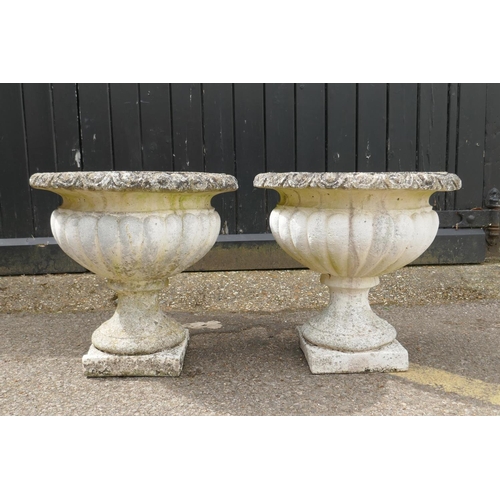 1132 - A pair of painted reconstituted stone planters, 45cm high x 46cm diameter