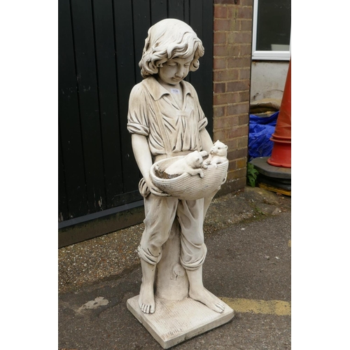 1135 - A painted reconstituted stone/concrete garden figure, boy with two puppies, 120cm high