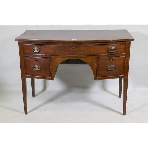 1141 - C19th mahogany three drawer bow fronted kneehole dressing table/desk, with original plate handles, r... 